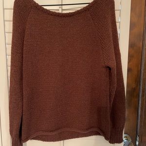 Medium (can be off the shoulder) brown sweater.